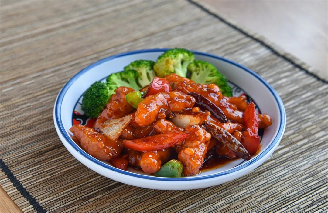 Crispy General Tso's chicken-s in sweet-sour sauce with broccoli at Panda Chinese Restaurant, a Chinese Restaurant in Detroit